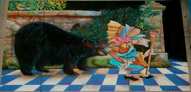 Lawrence Pretends not to Notice that a Bear is Attached to his Coattail.